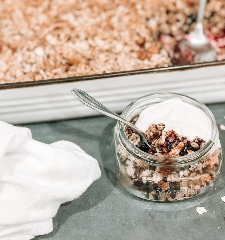 serving of blueberry oat crisp with yogurt